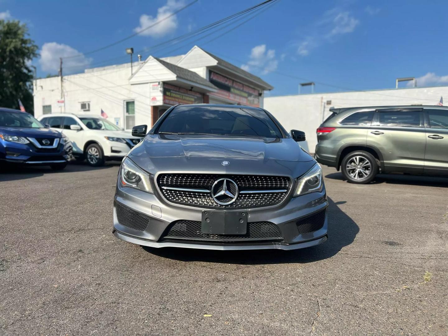 A 2016 Mercedes-Benz CLA showcasing its elegant design and sleek curves, emphasizing luxury and modern appeal.