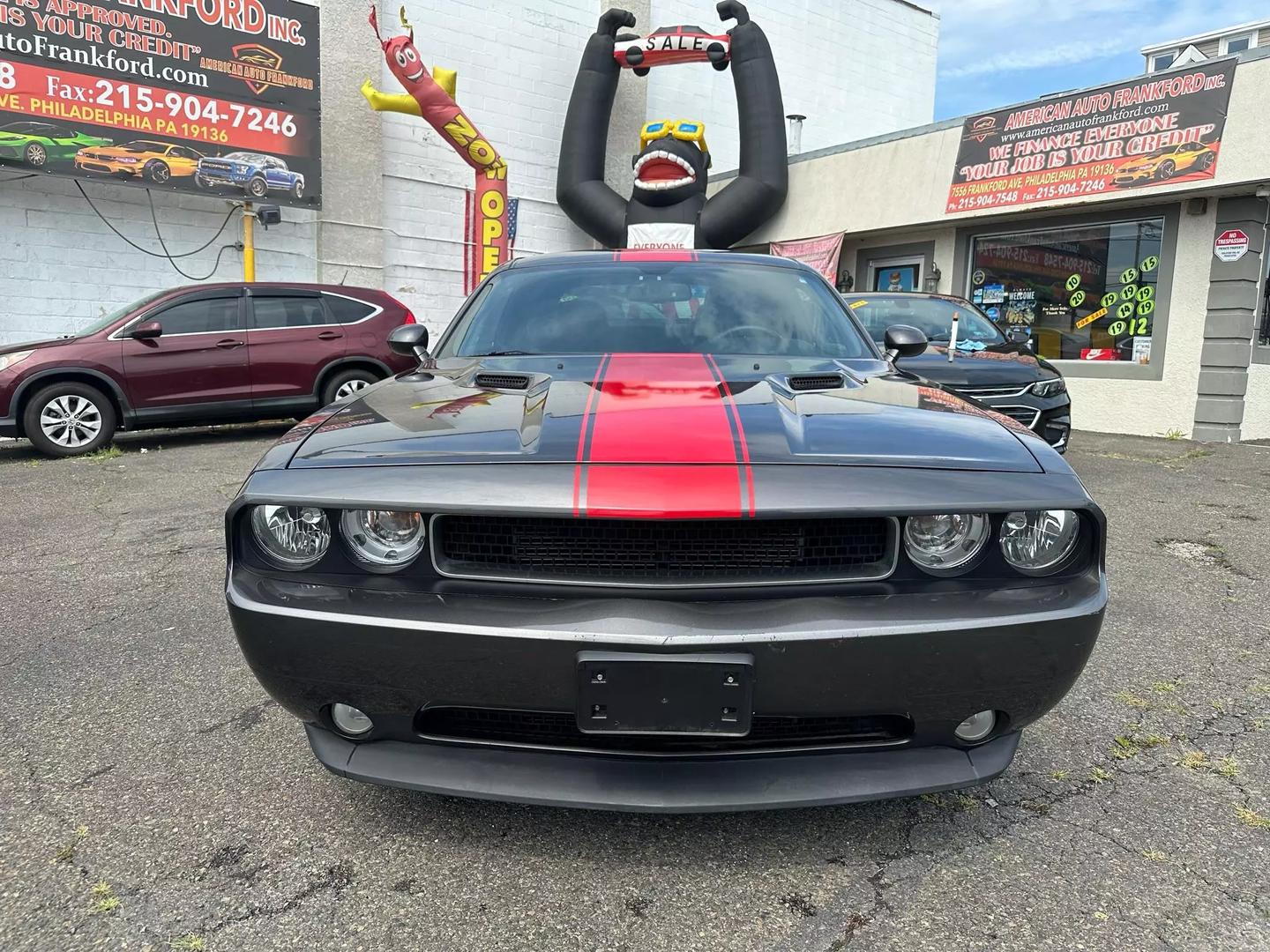 2014 Dodge Challenger with a bold design and sleek exterior, showcasing its powerful and dynamic presence.