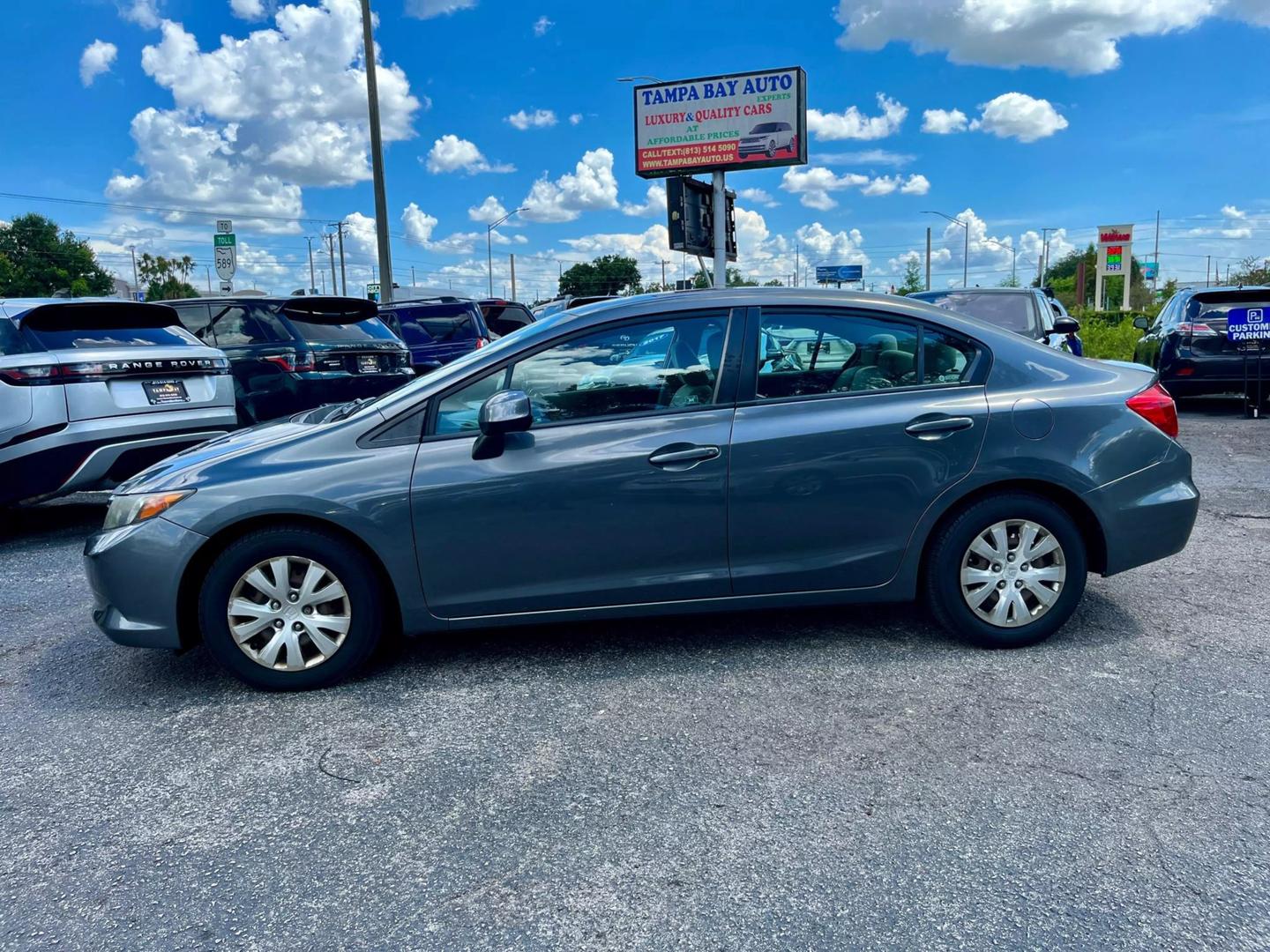 Used 2012 Honda Civic LX with VIN 2HGFB2F50CH314560 for sale in Tampa, FL