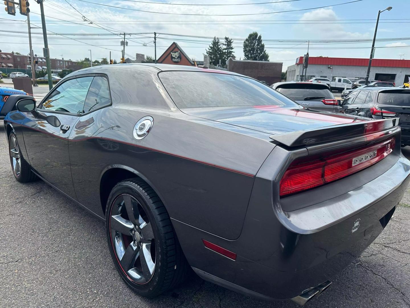 2014 Dodge Challenger with a bold design and sleek exterior, showcasing its powerful and dynamic presence.