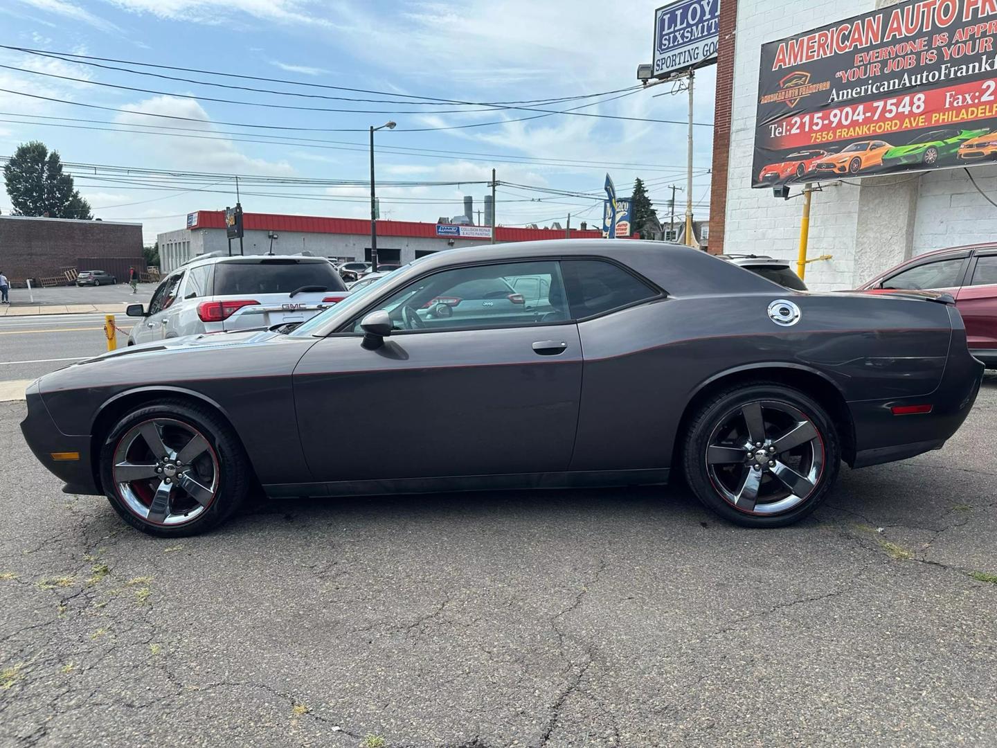 2014 Dodge Challenger with a bold design and sleek exterior, showcasing its powerful and dynamic presence.