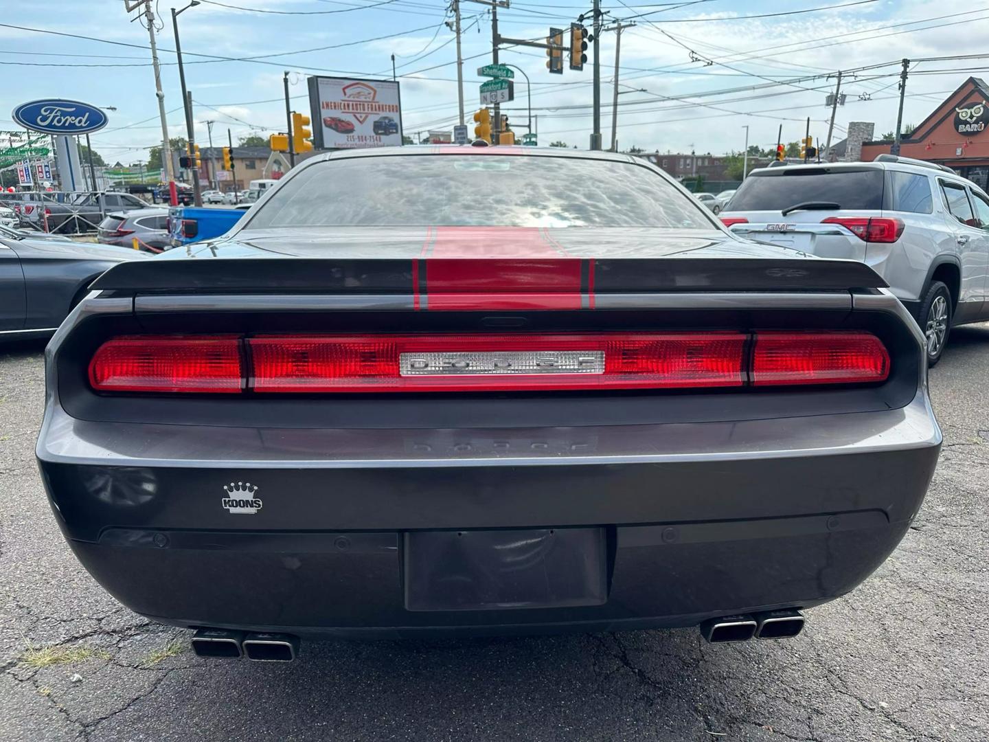 2014 Dodge Challenger with a bold design and sleek exterior, showcasing its powerful and dynamic presence.