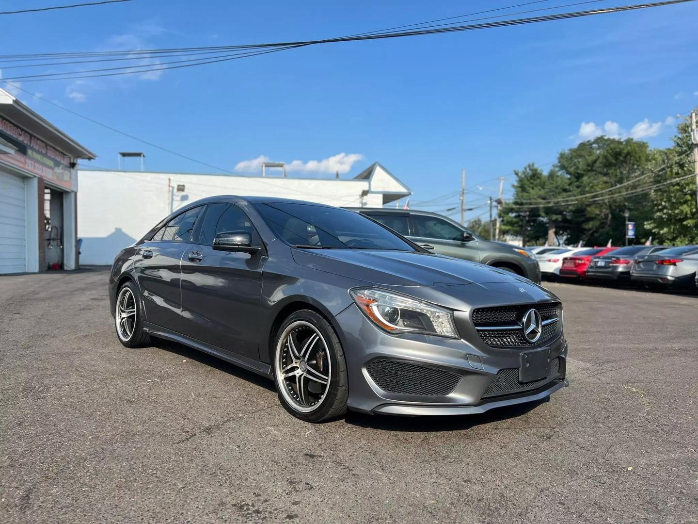 A 2016 Mercedes-Benz CLA showcasing its elegant design and sleek curves, emphasizing luxury and modern appeal.