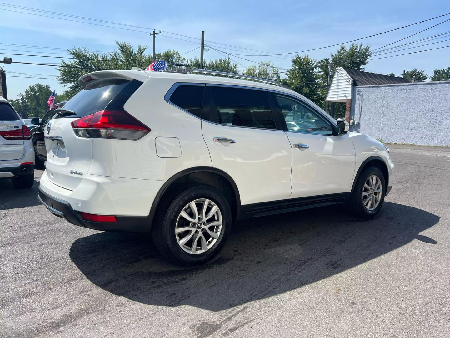 2019 Nissan Rogue SUV showcasing its sleek design and spacious interior, perfect for family and adventure.