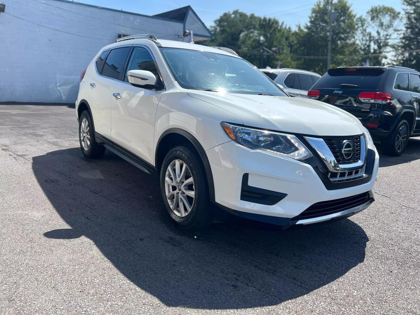 2019 Nissan Rogue SUV showcasing its sleek design and spacious interior, perfect for family and adventure.