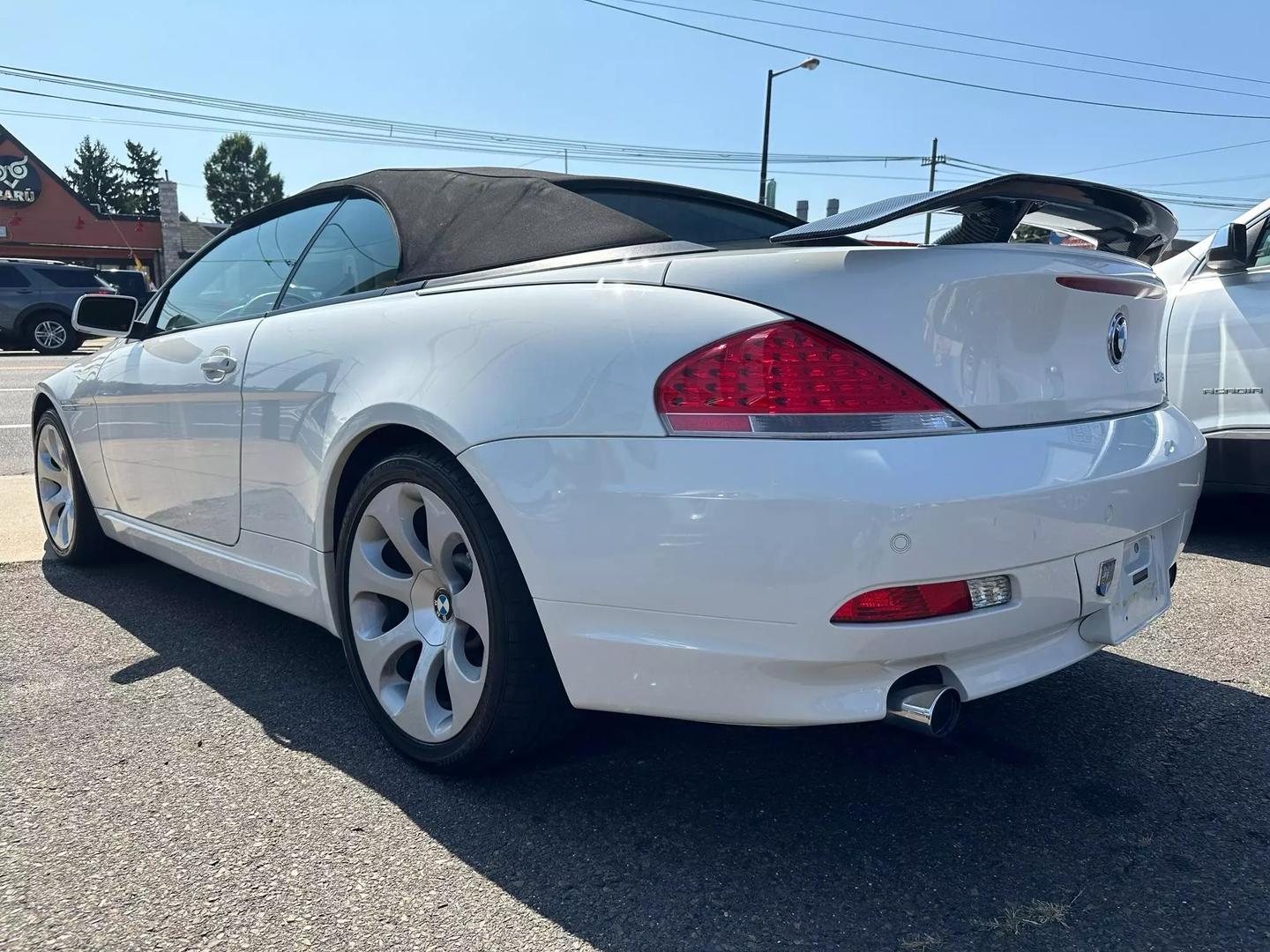 2004 BMW 6 Series showcasing sleek design, luxurious interiors, and powerful performance, epitomizing classic elegance and driving excellence.