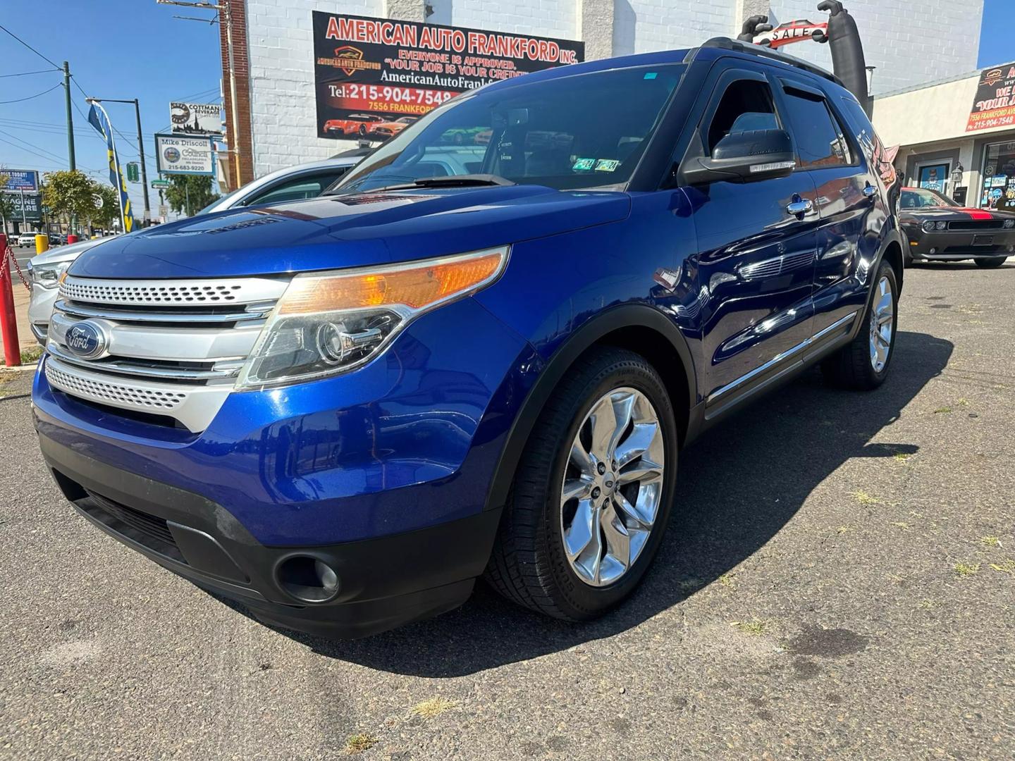 2014 Ford Explorer SUV with a spacious interior and sleek design, highlighting its modern features and powerful build.