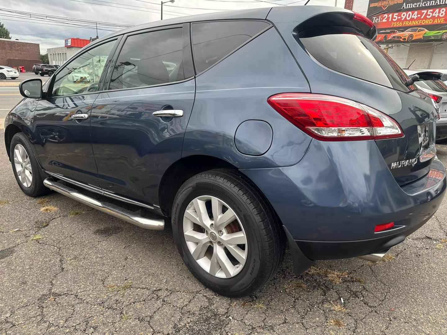 2014 Nissan Murano SUV with sleek design, spacious interior, and advanced features, offering comfort and performance for every journey.