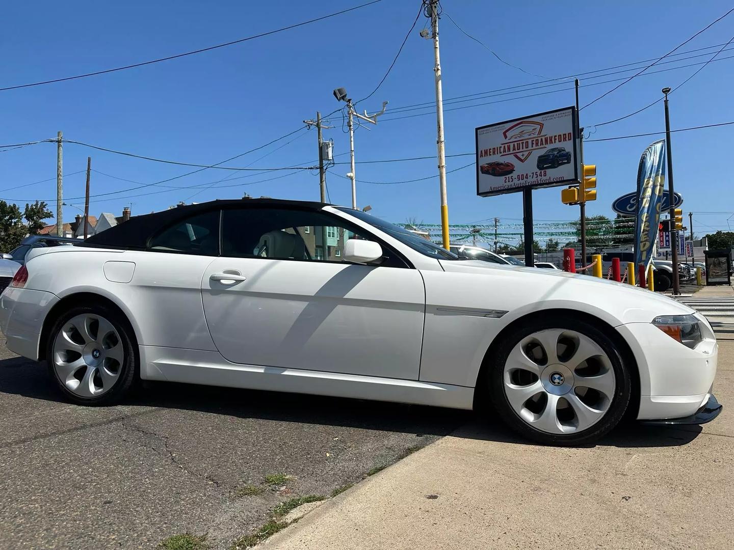 2004 BMW 6 Series showcasing sleek design, luxurious interiors, and powerful performance, epitomizing classic elegance and driving excellence.