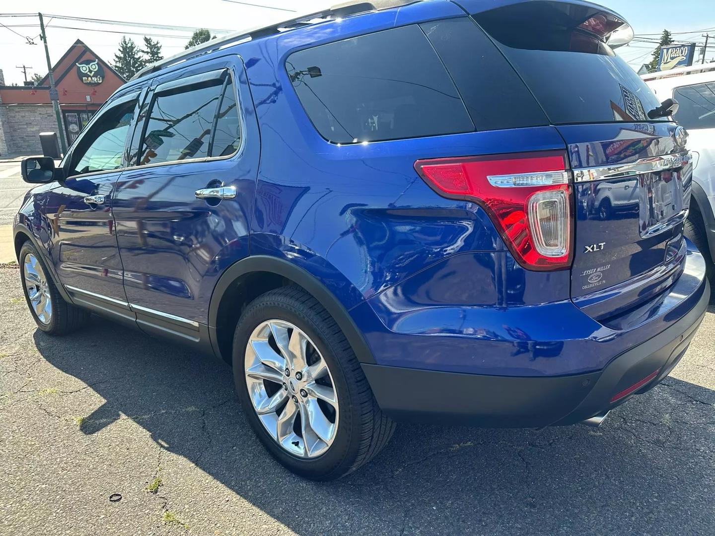 2014 Ford Explorer SUV with a spacious interior and sleek design, highlighting its modern features and powerful build.