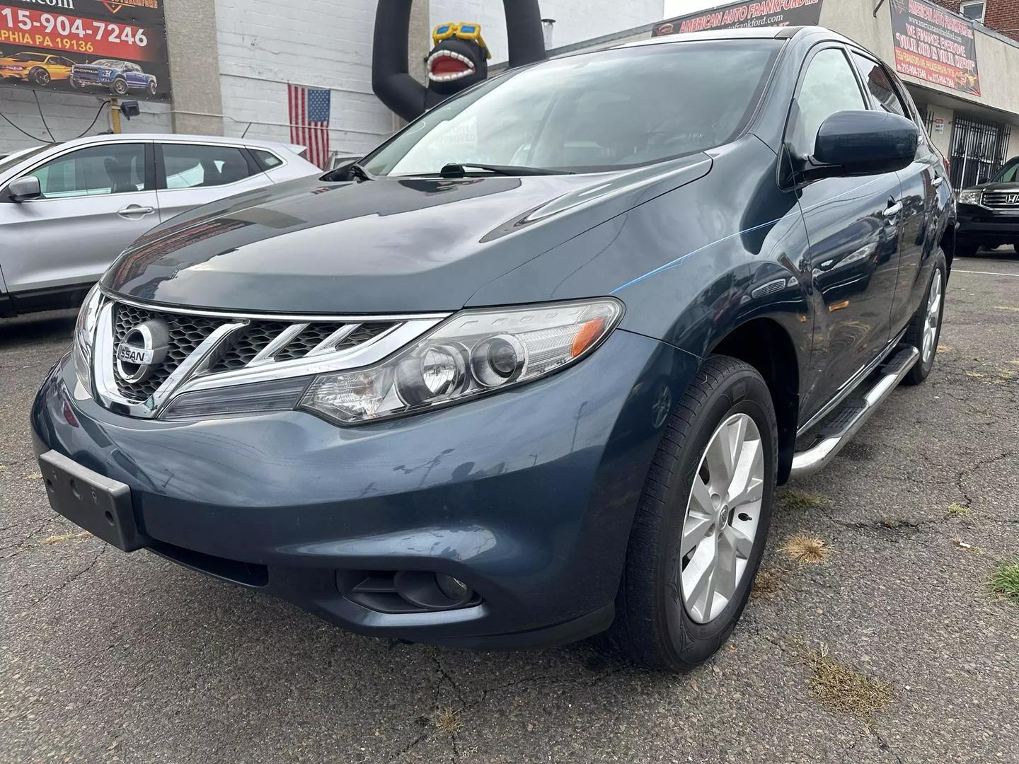 2014 Nissan Murano SUV with sleek design, spacious interior, and advanced features, offering comfort and performance for every journey.