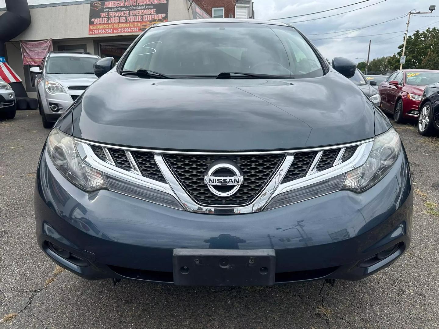 2014 Nissan Murano SUV with sleek design, spacious interior, and advanced features, offering comfort and performance for every journey.