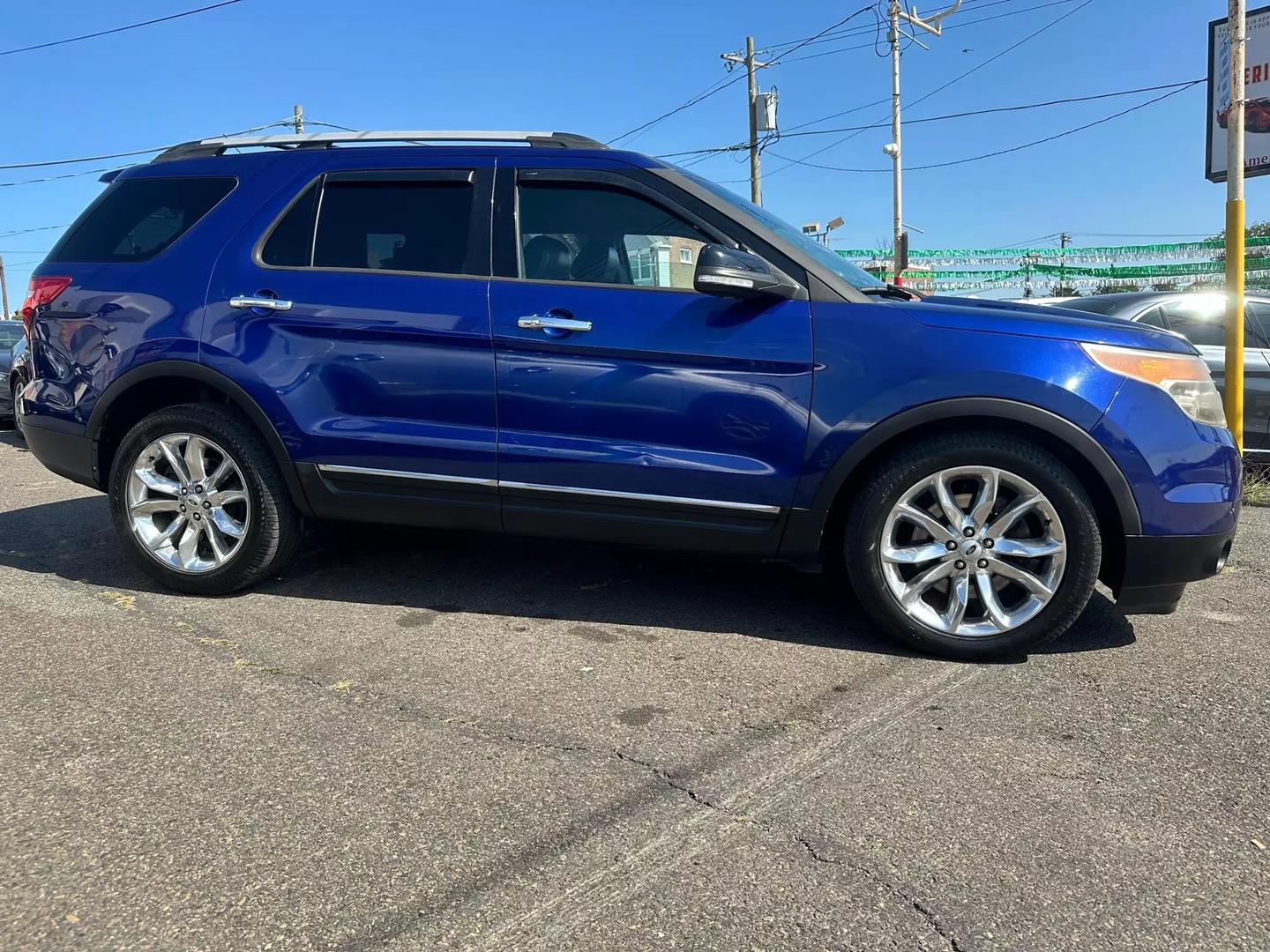 2014 Ford Explorer SUV with a spacious interior and sleek design, highlighting its modern features and powerful build.