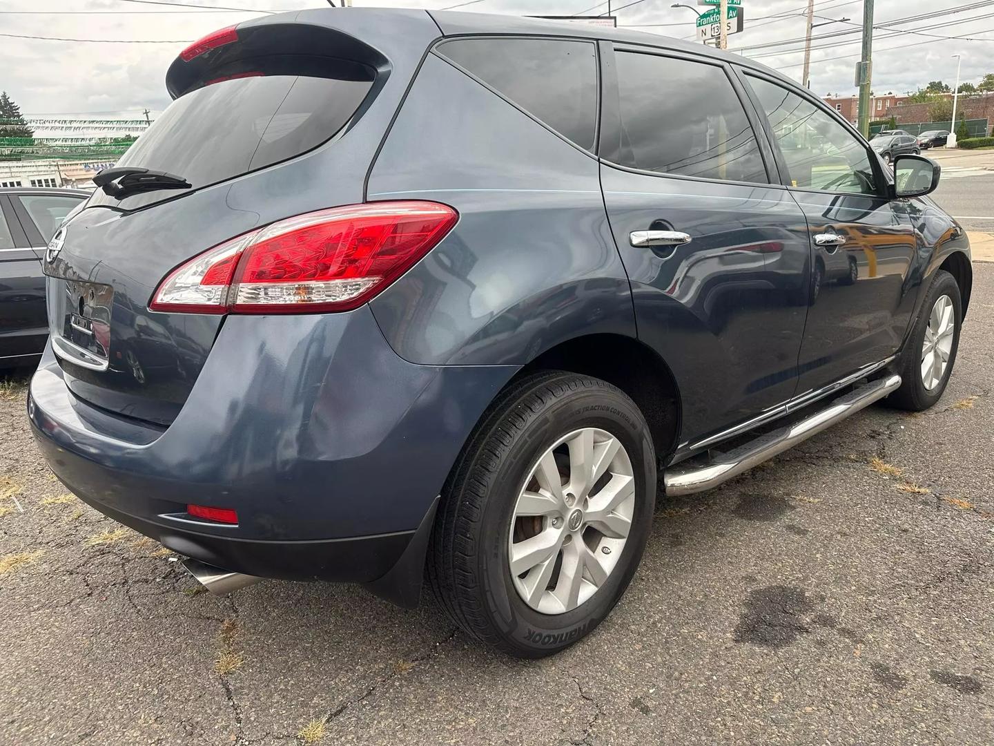 2014 Nissan Murano SUV with sleek design, spacious interior, and advanced features, offering comfort and performance for every journey.