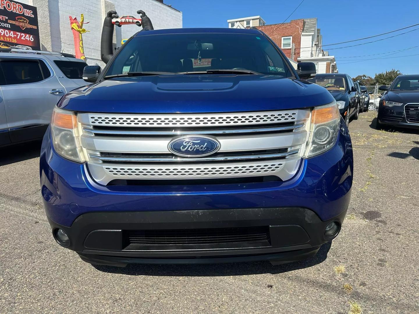 2014 Ford Explorer SUV with a spacious interior and sleek design, highlighting its modern features and powerful build.