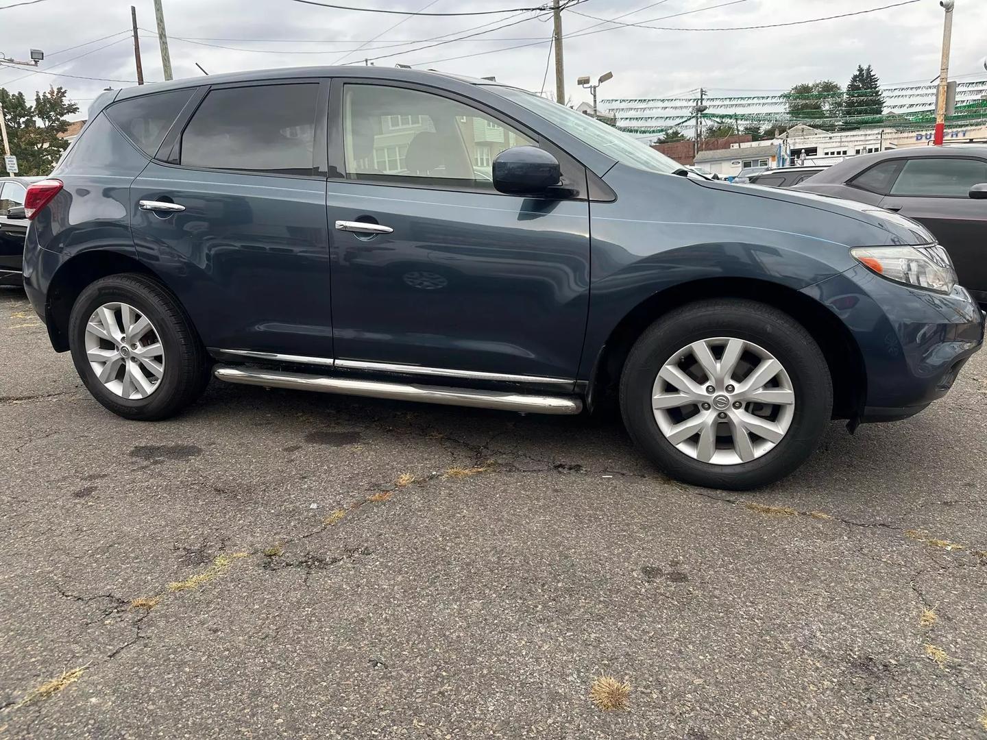 2014 Nissan Murano SUV with sleek design, spacious interior, and advanced features, offering comfort and performance for every journey.