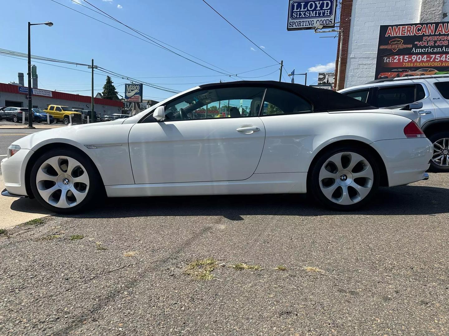 2004 BMW 6 Series showcasing sleek design, luxurious interiors, and powerful performance, epitomizing classic elegance and driving excellence.