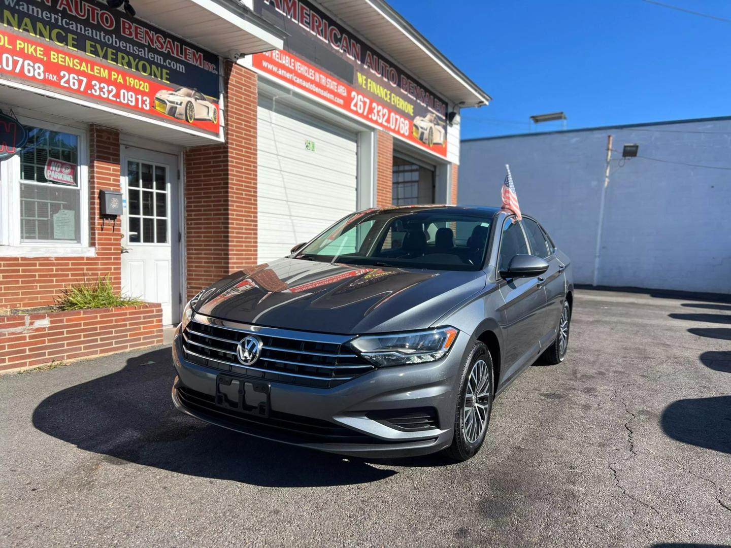 2019 Volkswagen Jetta with a sleek, modern design, showcasing its stylish exterior, advanced headlights, and smooth body lines.