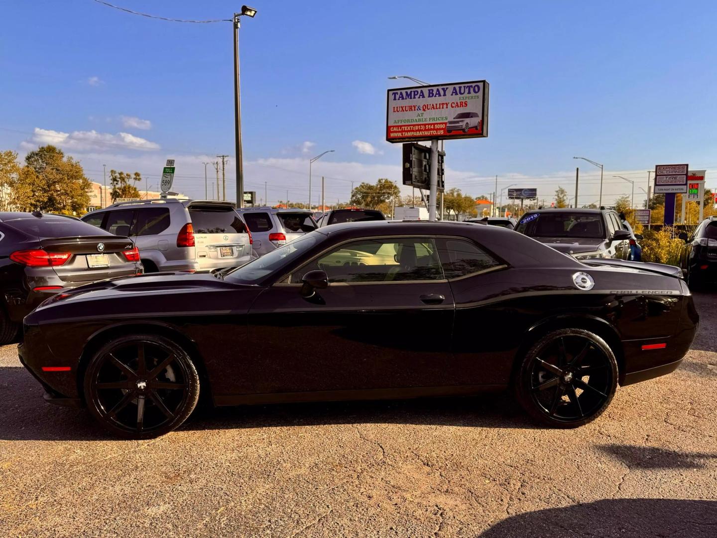 Used 2015 Dodge Challenger SXT with VIN 2C3CDZBG7FH705662 for sale in Tampa, FL