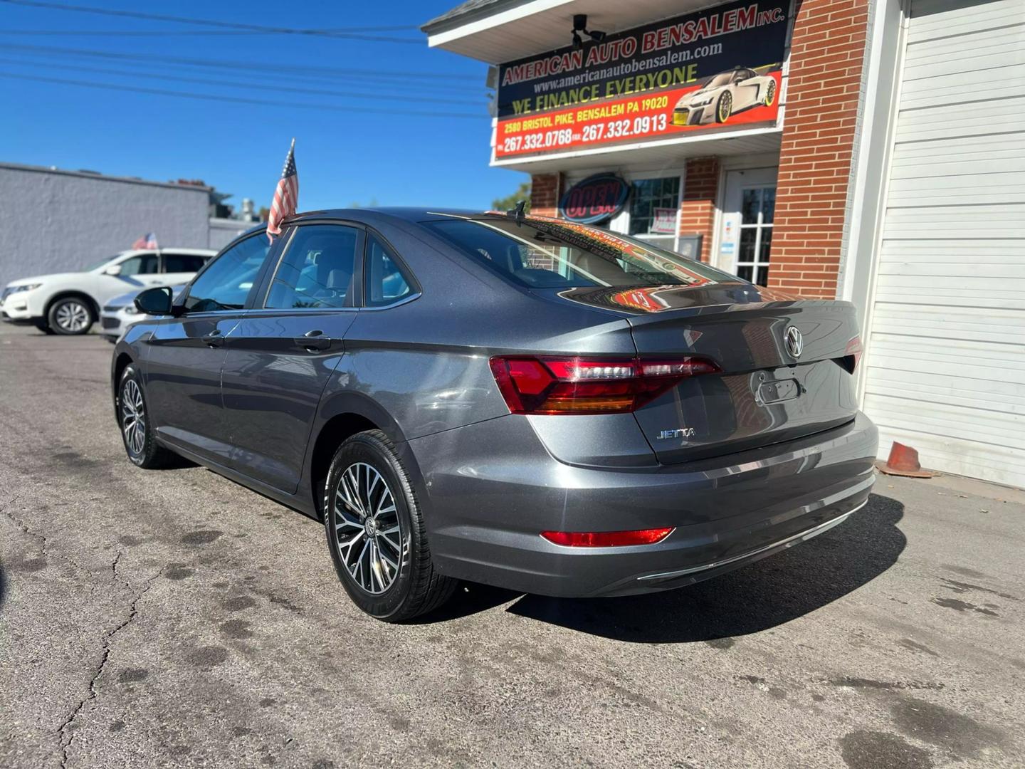 2019 Volkswagen Jetta with a sleek, modern design, showcasing its stylish exterior, advanced headlights, and smooth body lines.