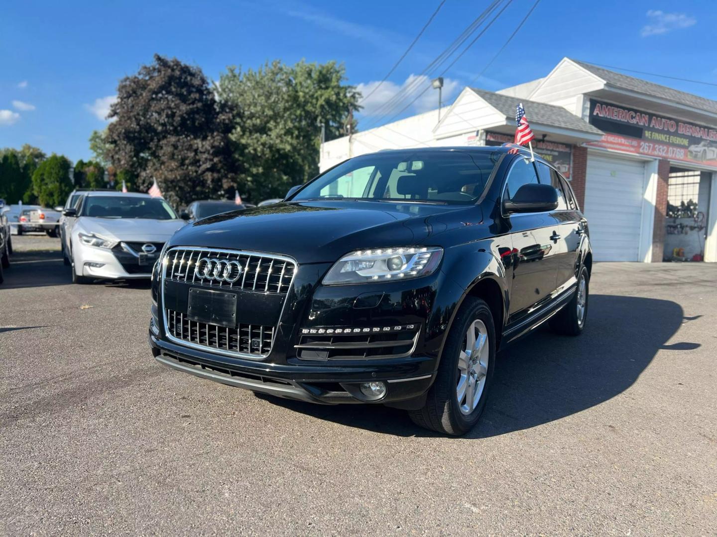 2015 Audi Q7, luxury SUV with a sleek design, bold grille, and elegant lines, showcasing sophistication and performance.