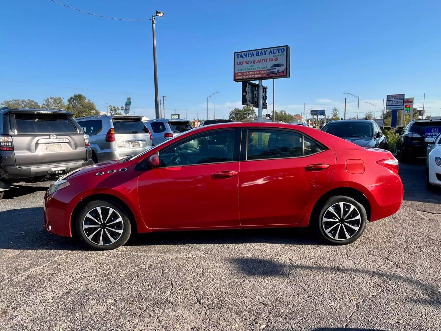 Used 2014 Toyota Corolla L with VIN 2T1BURHE5EC082855 for sale in Tampa, FL