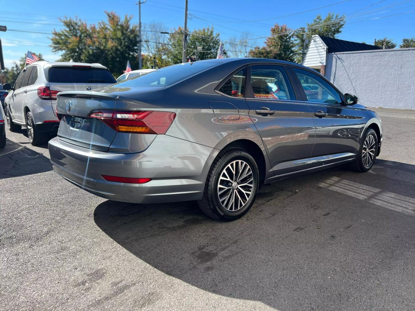 2019 Volkswagen Jetta with a sleek, modern design, showcasing its stylish exterior, advanced headlights, and smooth body lines.