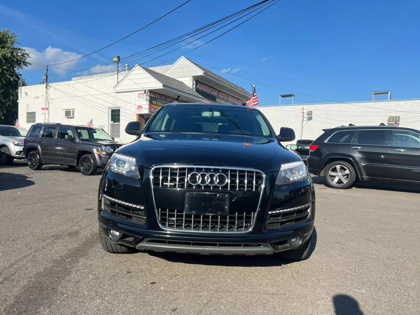 2015 Audi Q7, luxury SUV with a sleek design, bold grille, and elegant lines, showcasing sophistication and performance.