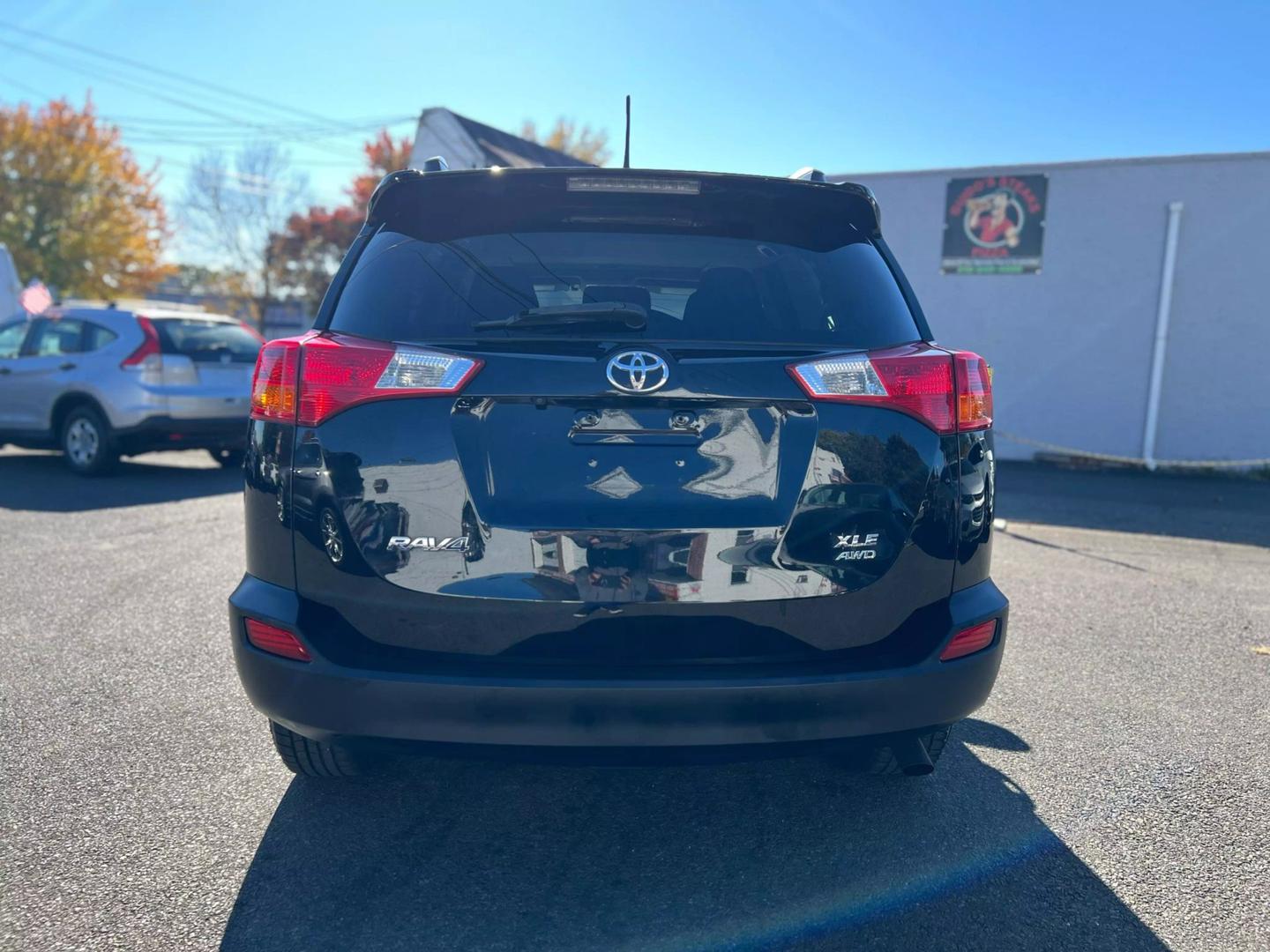 2014 Toyota RAV4, a compact SUV known for its reliability, spacious interior, and modern features suitable for family or daily use.