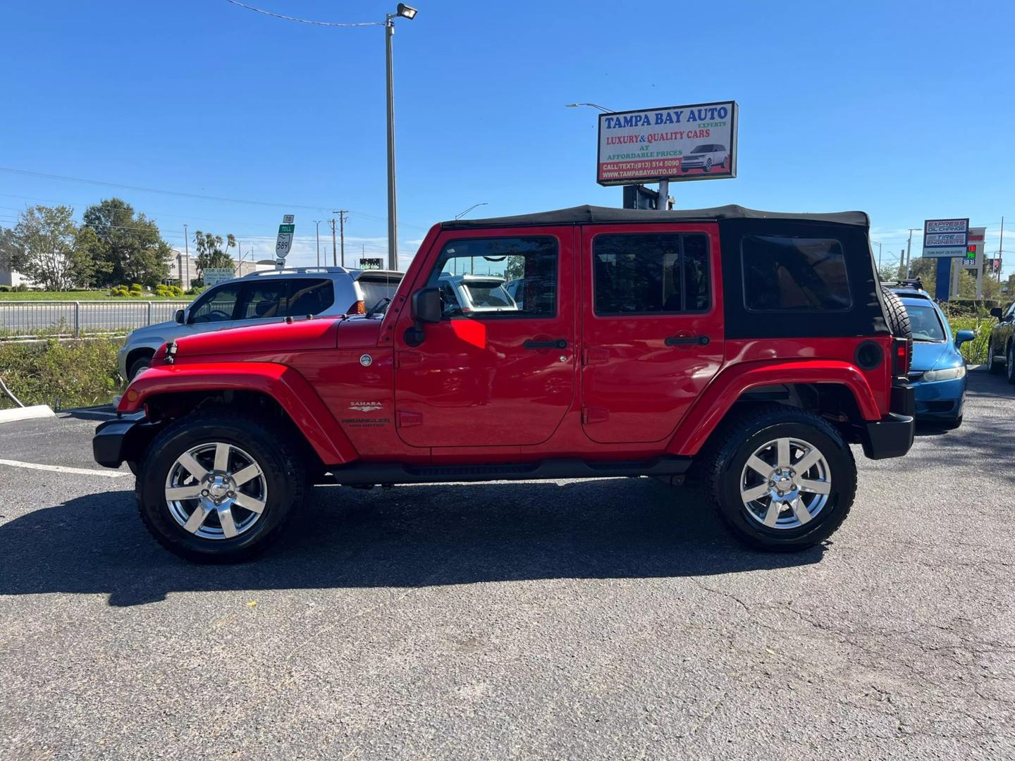 Used 2015 Jeep Wrangler Unlimited X with VIN 1C4HJWEG6FL525077 for sale in Tampa, FL