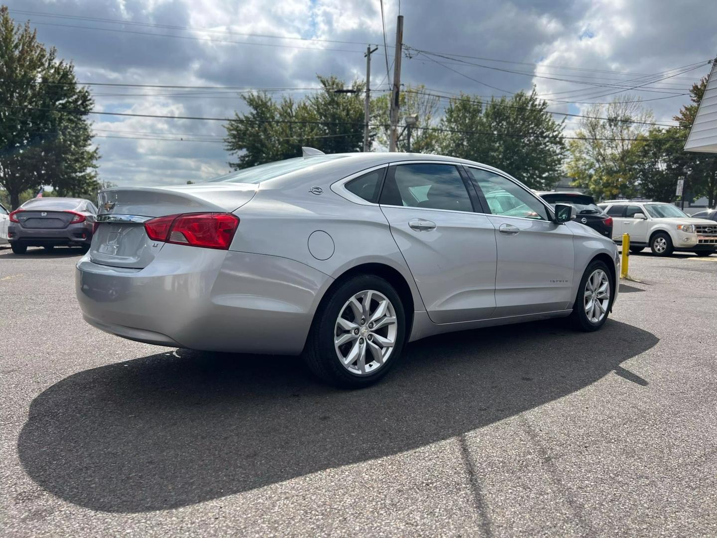 Close-up view of 2019 Chevrolet Impala showcasing sleek design and modern features.