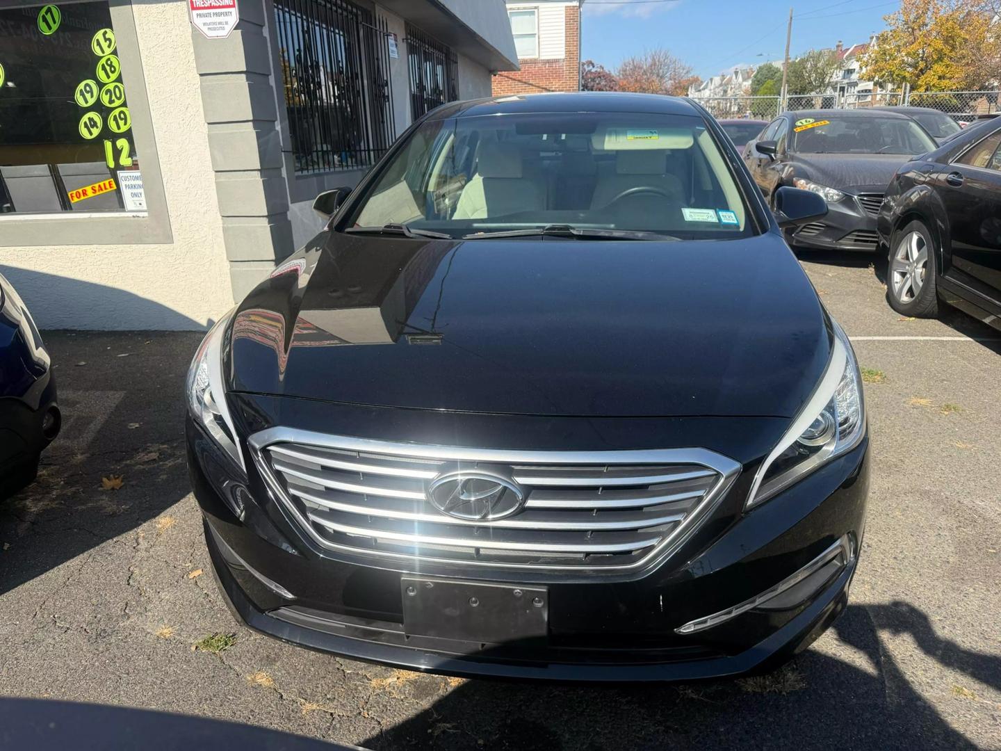 2015 Hyundai Sonata showcasing sleek design, modern technology, and comfortable interior, perfect for a smooth and stylish drive.