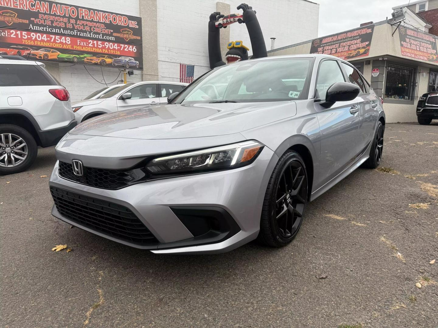 Showcasing the impressive features of the 2022 Honda Civic: a bold exterior, cutting-edge interior tech, and superior safety innovations for an exceptional drive.