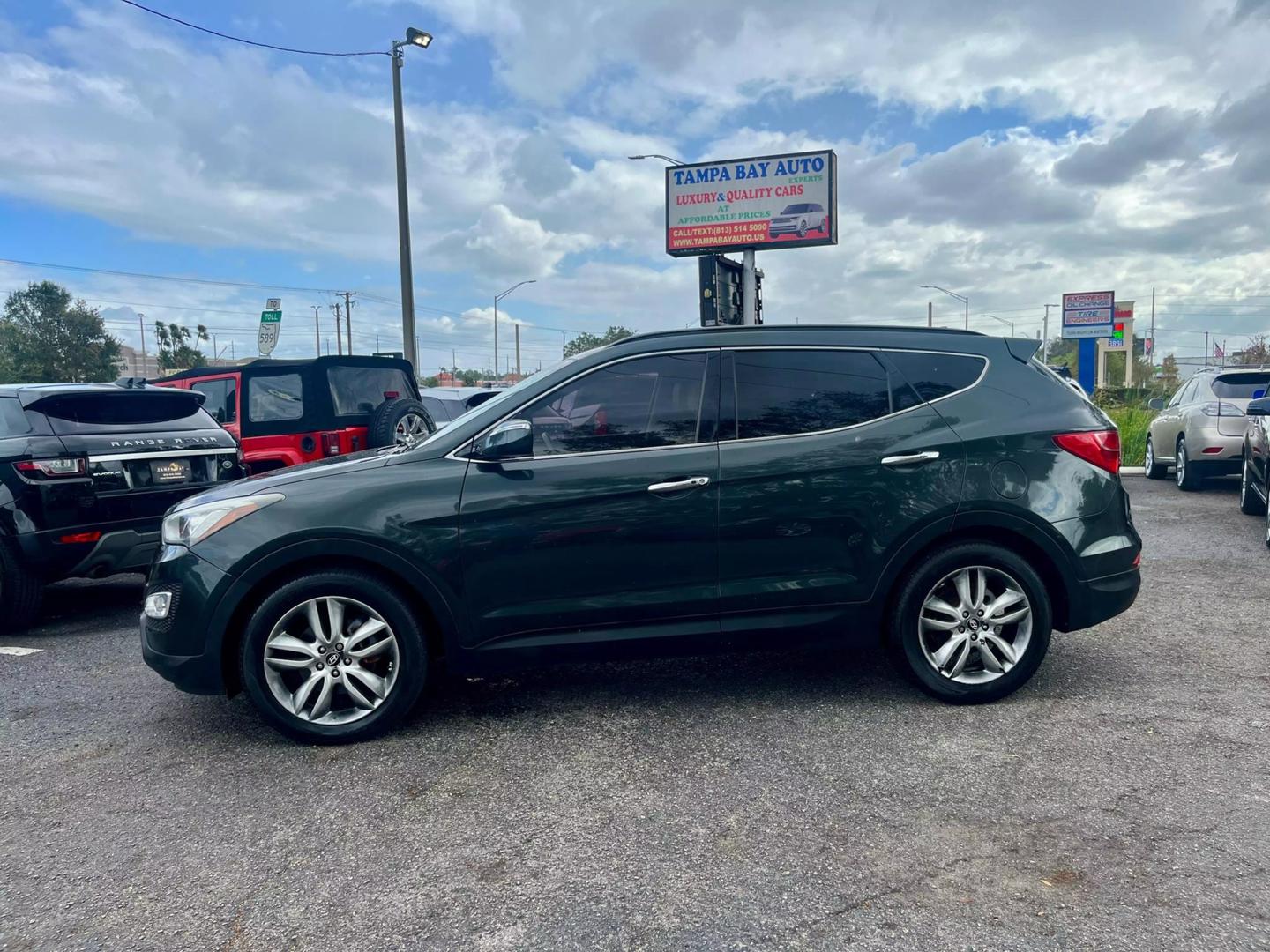 Used 2013 Hyundai Santa Fe Sport 2.0T with VIN 5XYZU3LAXDG114721 for sale in Tampa, FL