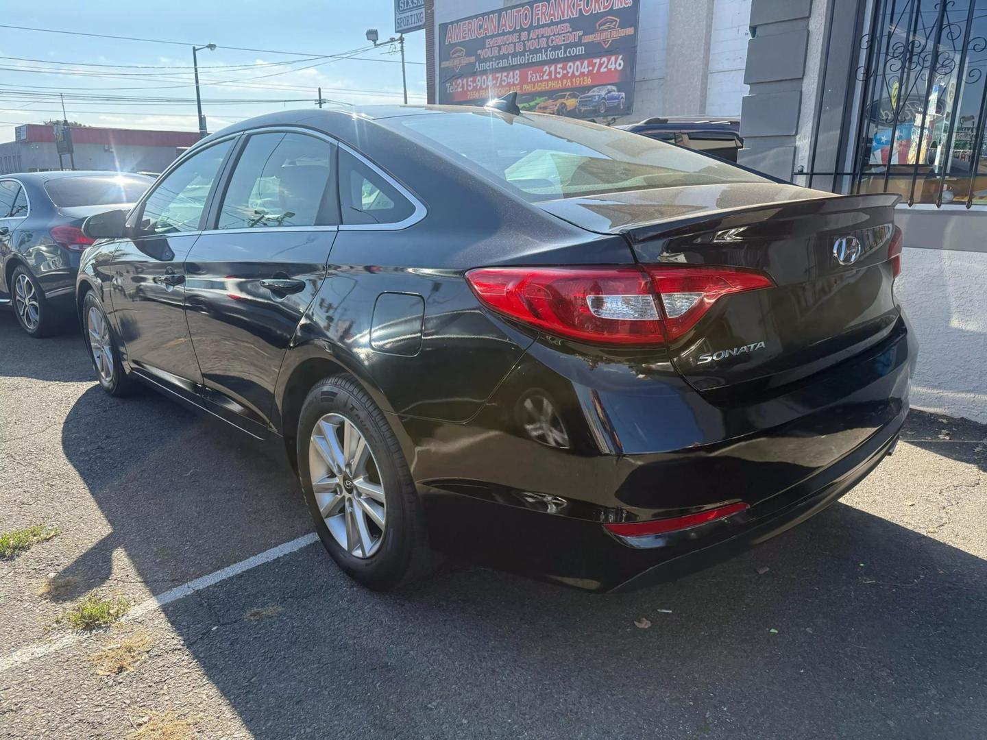 2015 Hyundai Sonata showcasing sleek design, modern technology, and comfortable interior, perfect for a smooth and stylish drive.