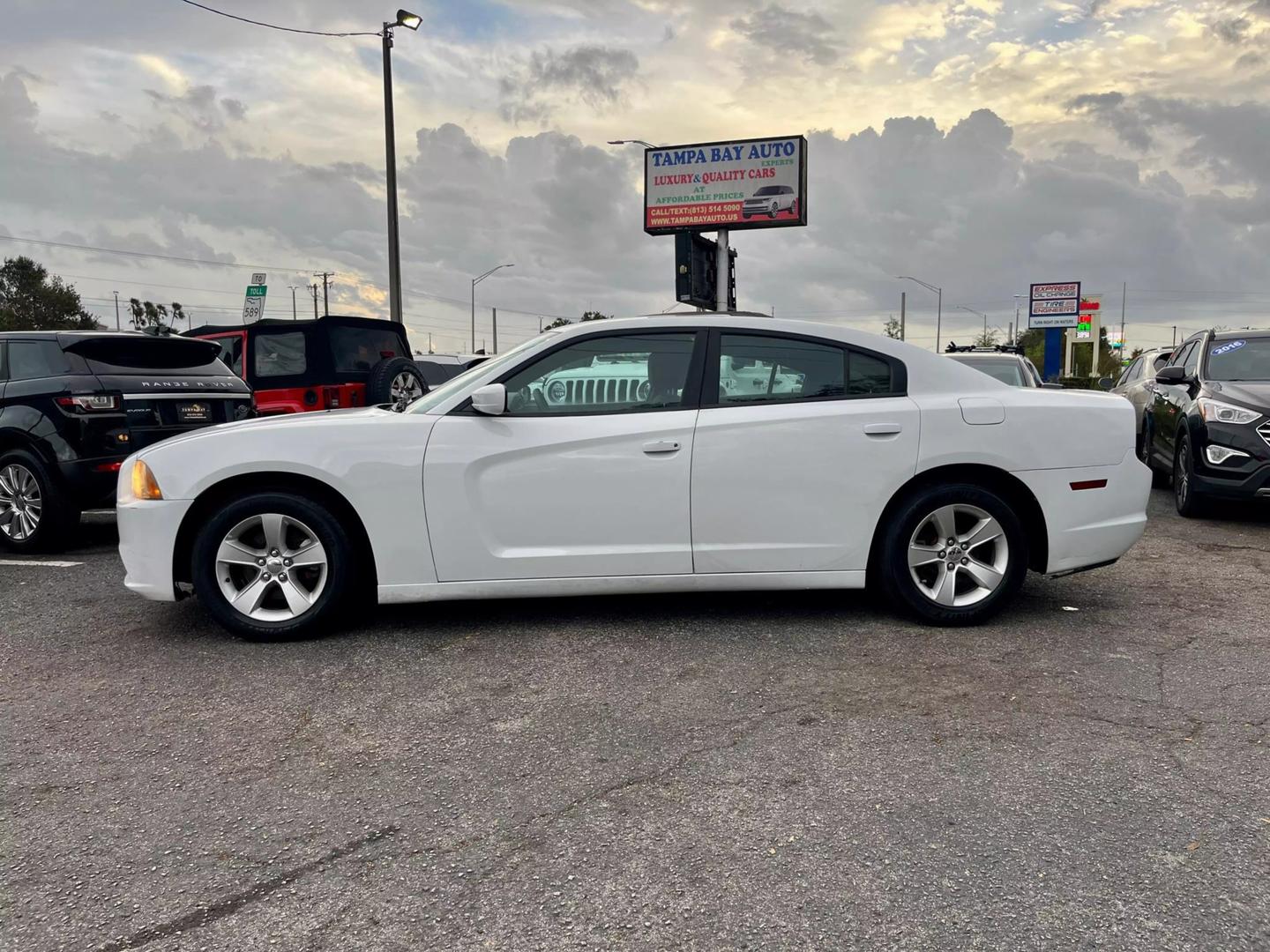 Used 2012 Dodge Charger SE with VIN 2C3CDXBG1CH297627 for sale in Tampa, FL