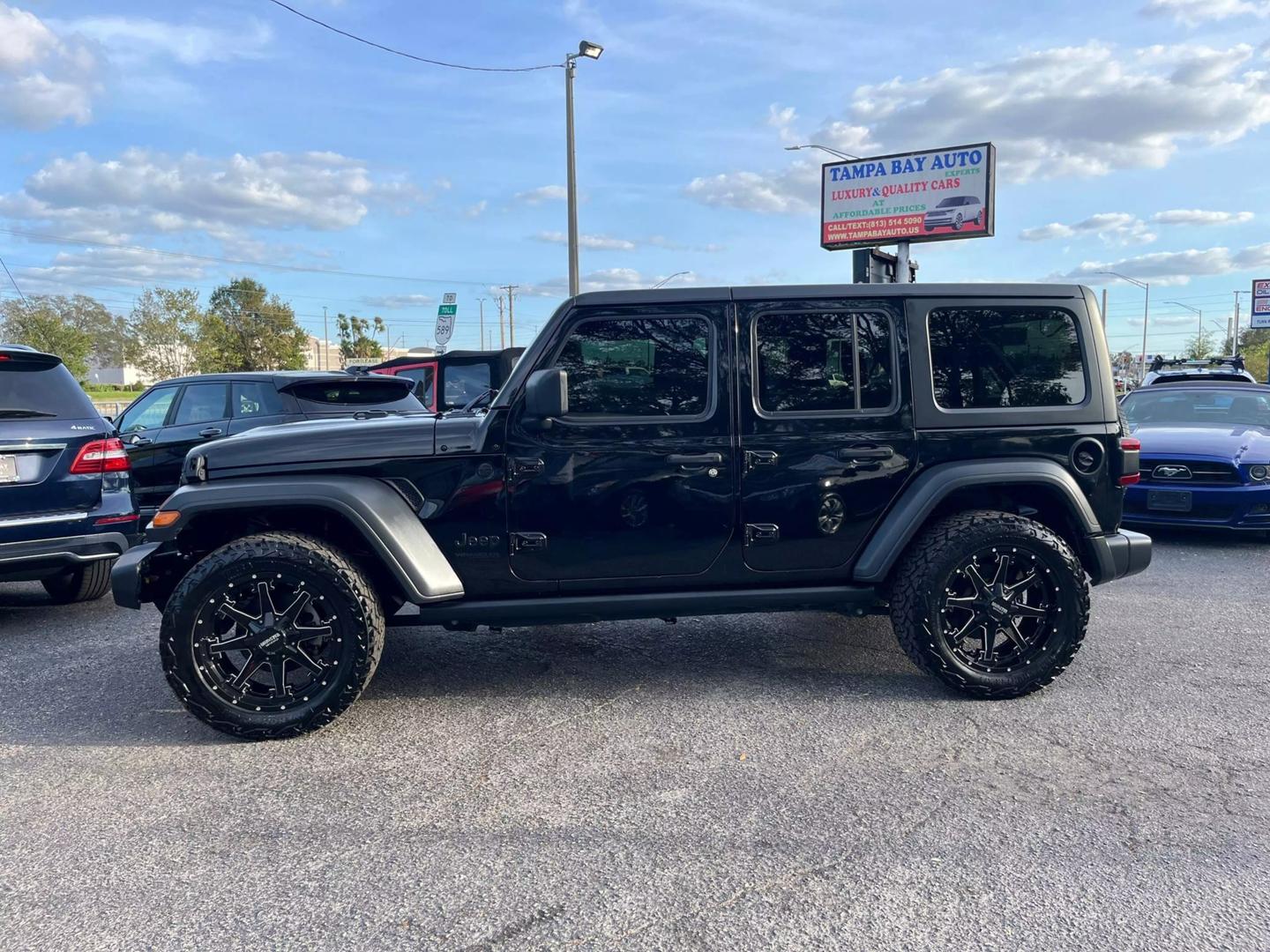 Used 2020 Jeep Wrangler Unlimited Altitude with VIN 1C4HJXDN4LW284510 for sale in Tampa, FL