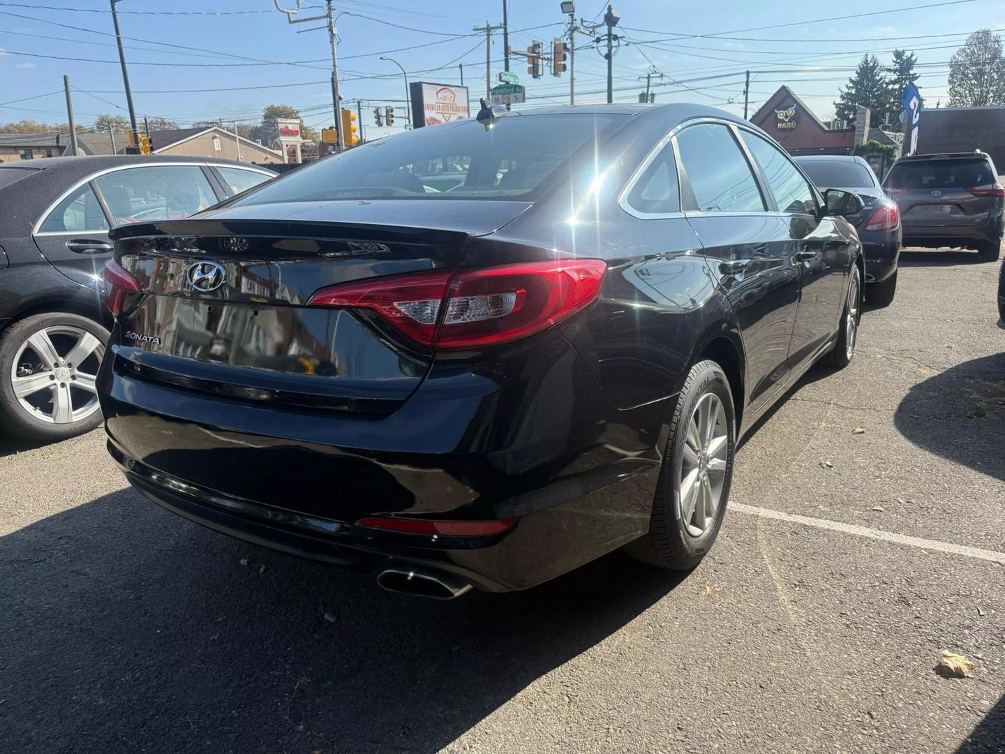 2015 Hyundai Sonata showcasing sleek design, modern technology, and comfortable interior, perfect for a smooth and stylish drive.