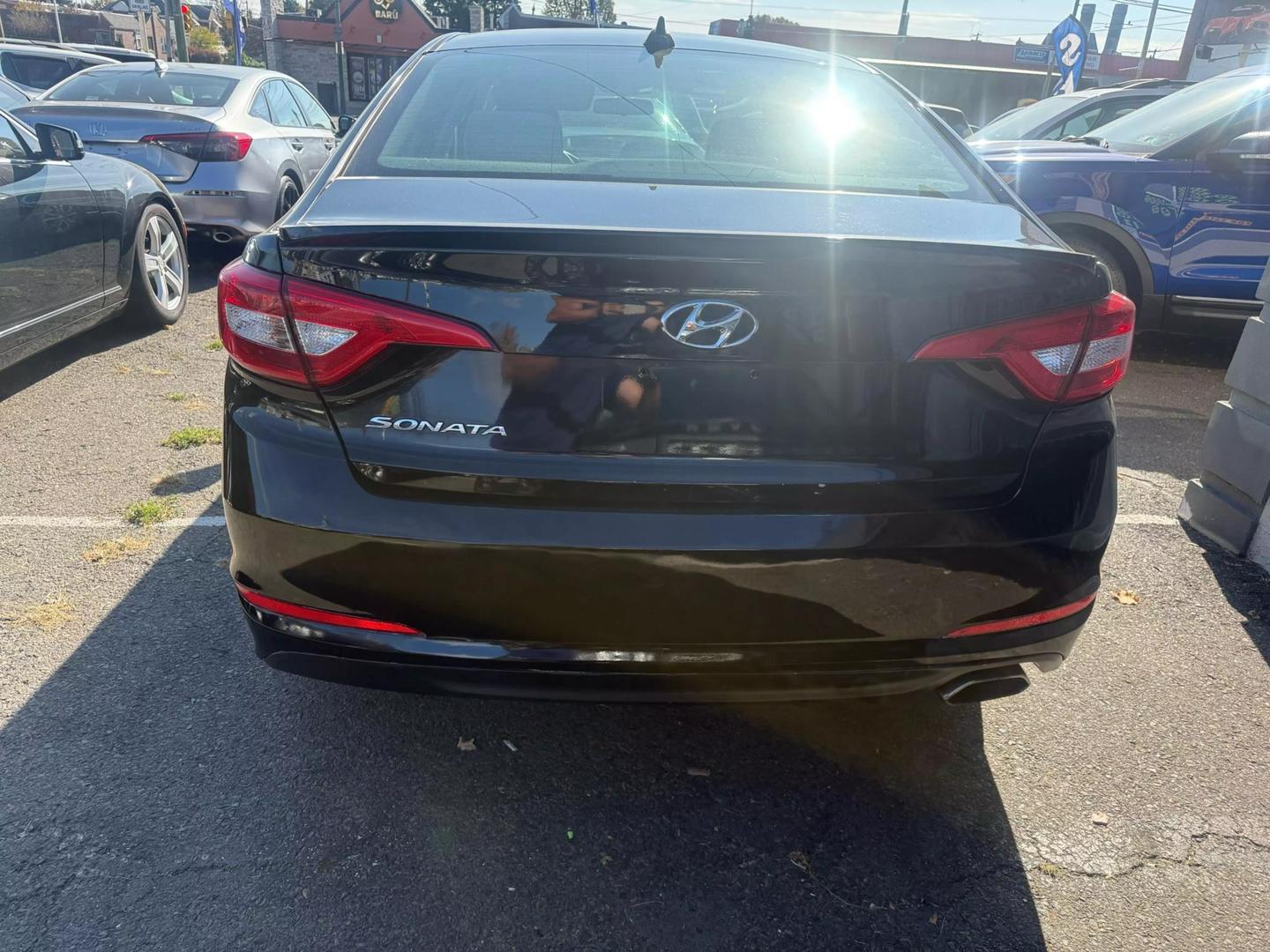 2015 Hyundai Sonata showcasing sleek design, modern technology, and comfortable interior, perfect for a smooth and stylish drive.