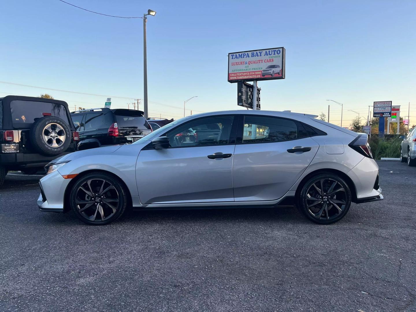 Used 2018 Honda Civic Hatchback Sport with VIN SHHFK7H49JU216211 for sale in Tampa, FL