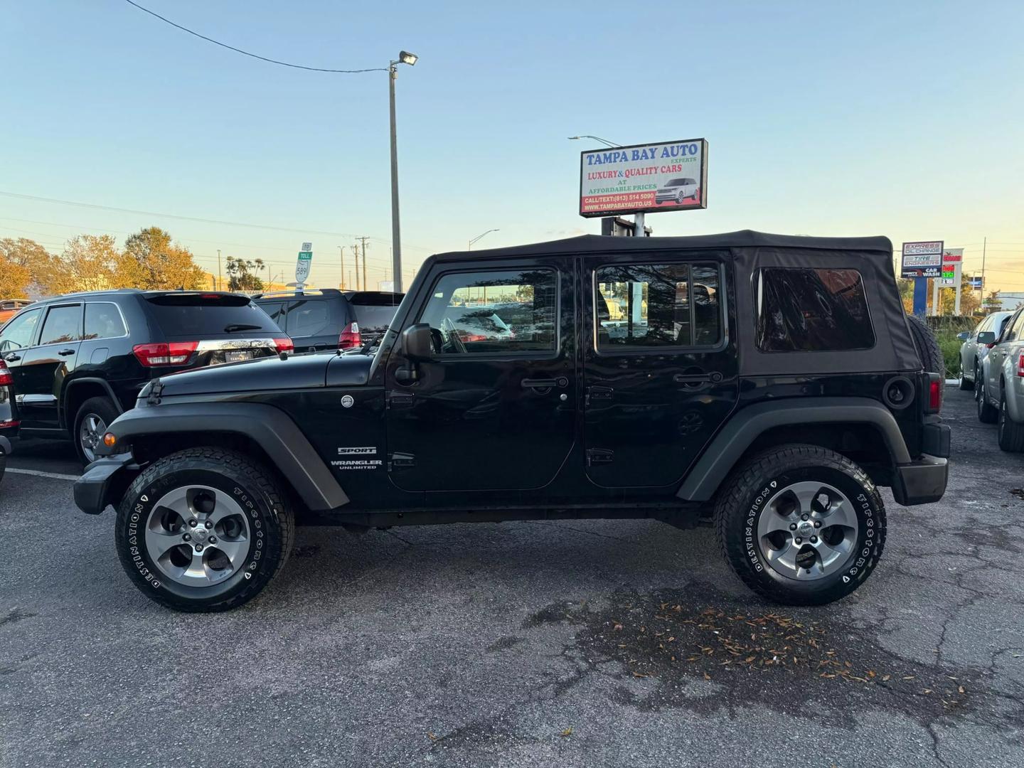 Used 2017 Jeep Wrangler Unlimited Sport with VIN 1C4BJWDG3HL534717 for sale in Tampa, FL