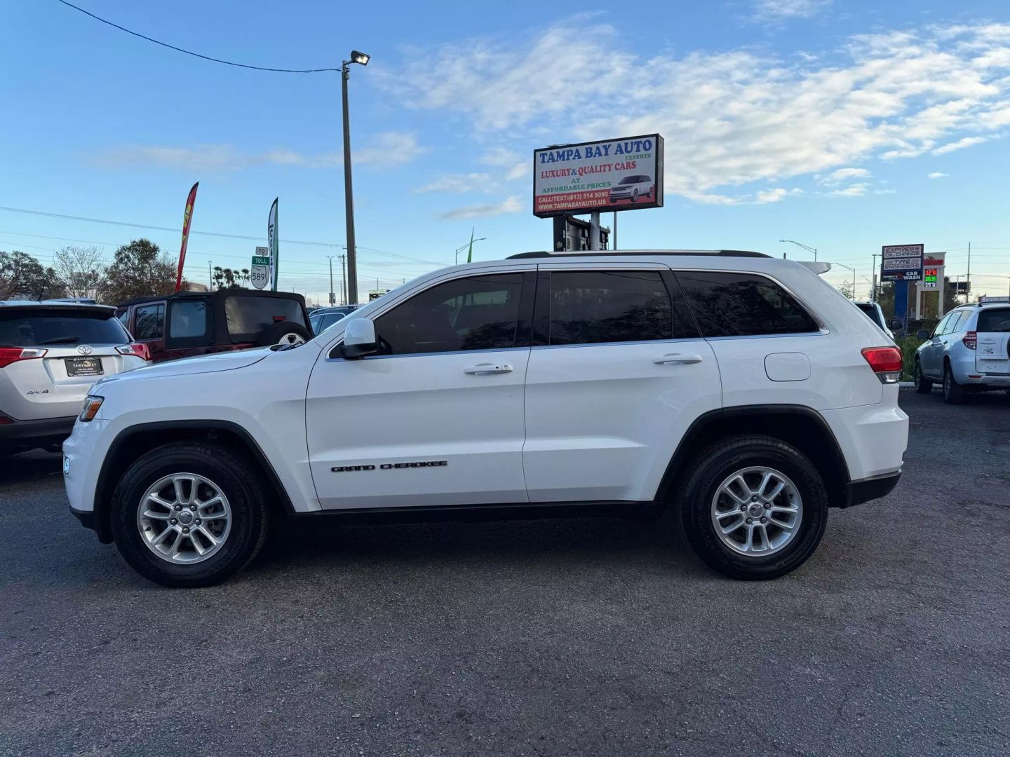 Used 2018 Jeep Grand Cherokee Laredo E with VIN 1C4RJEAG8JC253659 for sale in Tampa, FL