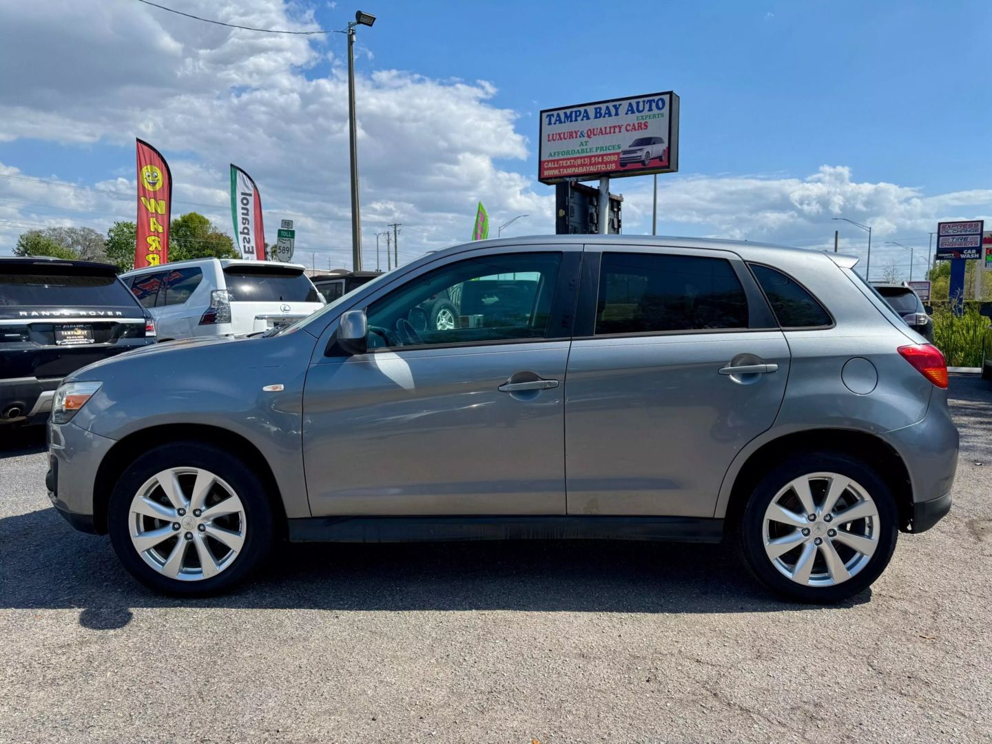 Used 2015 Mitsubishi Outlander Sport ES with VIN 4A4AP3AU3FE035672 for sale in Tampa, FL