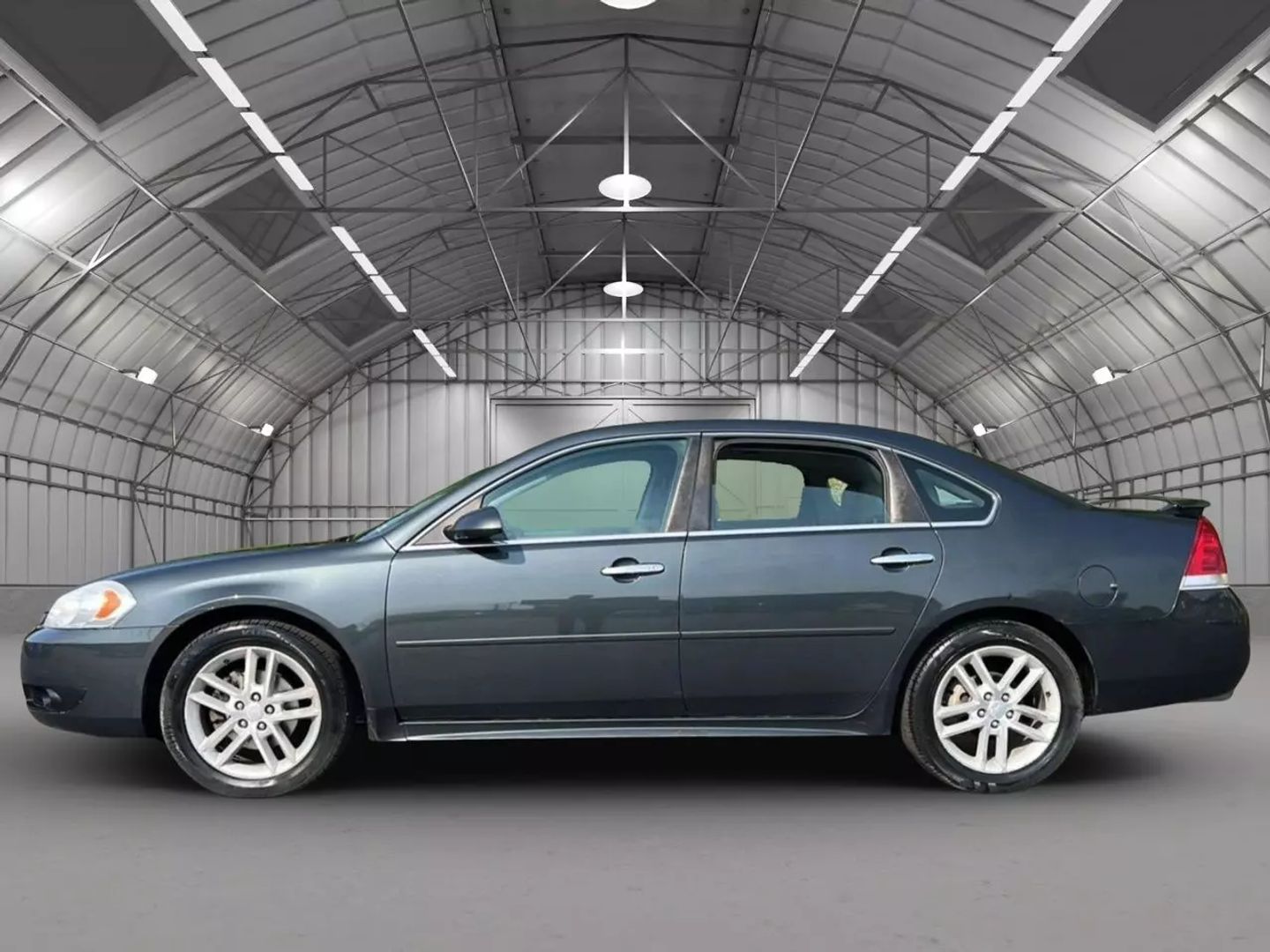 Used 2012 Chevrolet Impala LTZ with VIN 2G1WC5E32C1325591 for sale in Kansas City