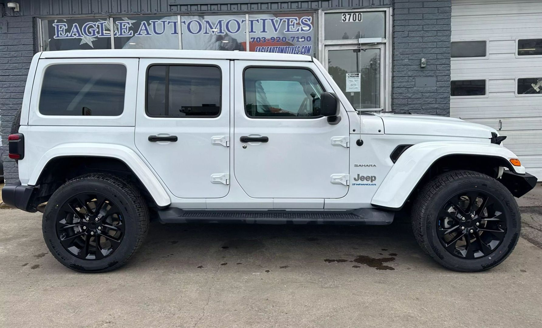 Used 2023 Jeep Wrangler 4xe Sahara 4XE with VIN 1C4JJXP60PW627163 for sale in Arlington, VA
