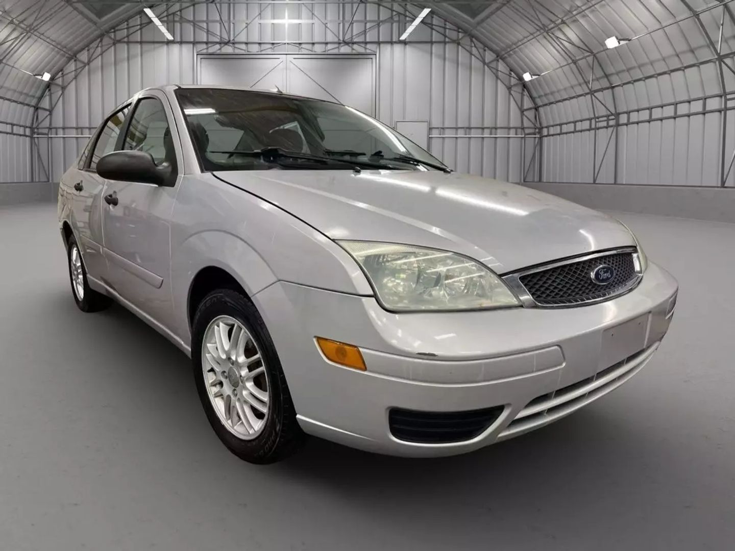 Used 2005 Ford Focus ZX4 S with VIN 1FAFP34N75W131398 for sale in Kansas City