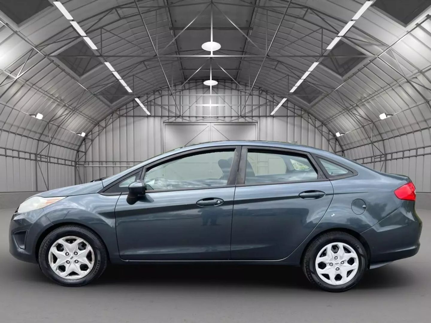 Used 2011 Ford Fiesta SE with VIN 3FADP4BJ4BM240670 for sale in Kansas City