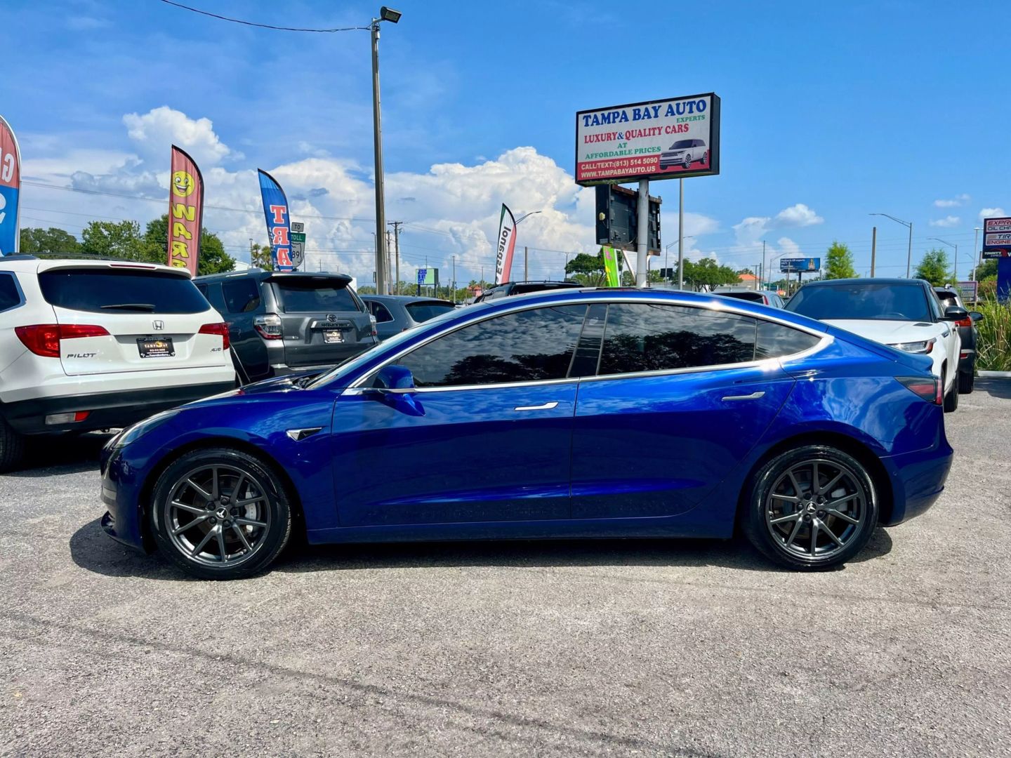 Used 2019 Tesla Model 3 Base with VIN 5YJ3E1EA2KF427092 for sale in Tampa, FL