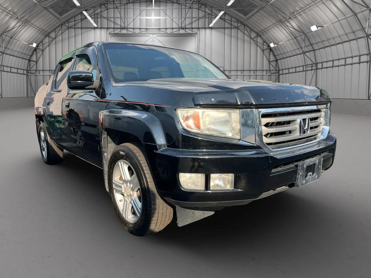 Used 2012 Honda Ridgeline RTL with VIN 5FPYK1F58CB454158 for sale in Kansas City