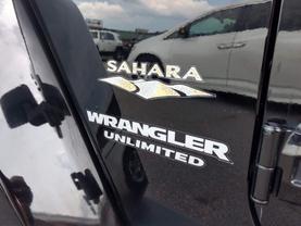 2010 JEEP WRANGLER SUV V6, 3.8 LITER UNLIMITED SAHARA SPORT UTILITY 4D - LA Auto Star
